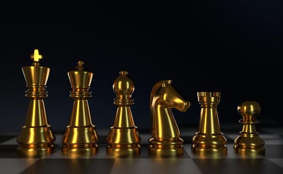 The relevance of gold as a strategic asset: 2021 gold chess set standing for gold as a strategic investment asset in 2021