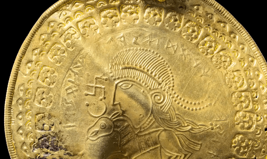 Norse god Odin on a gold disc