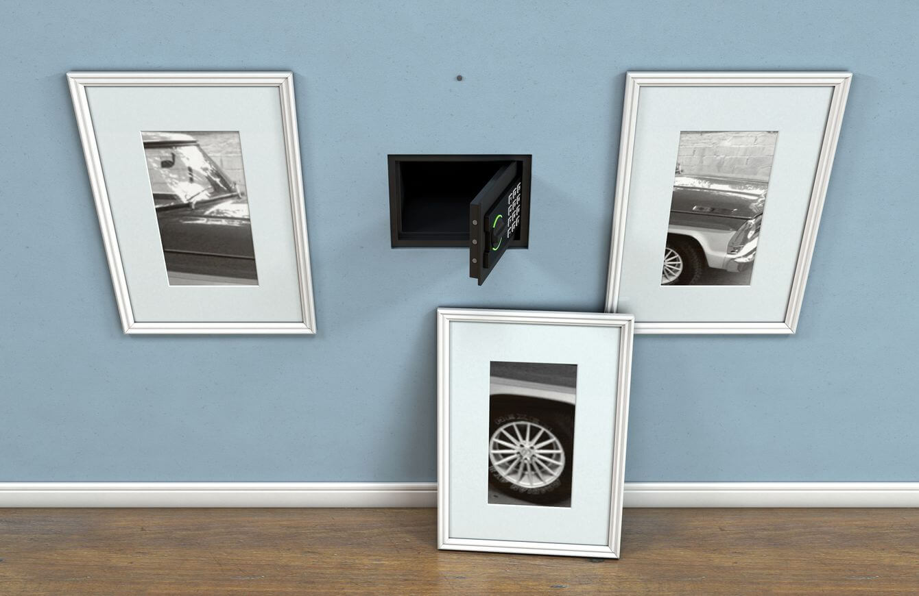 a wall safe to hide physical gold and silver covered with a picture frame